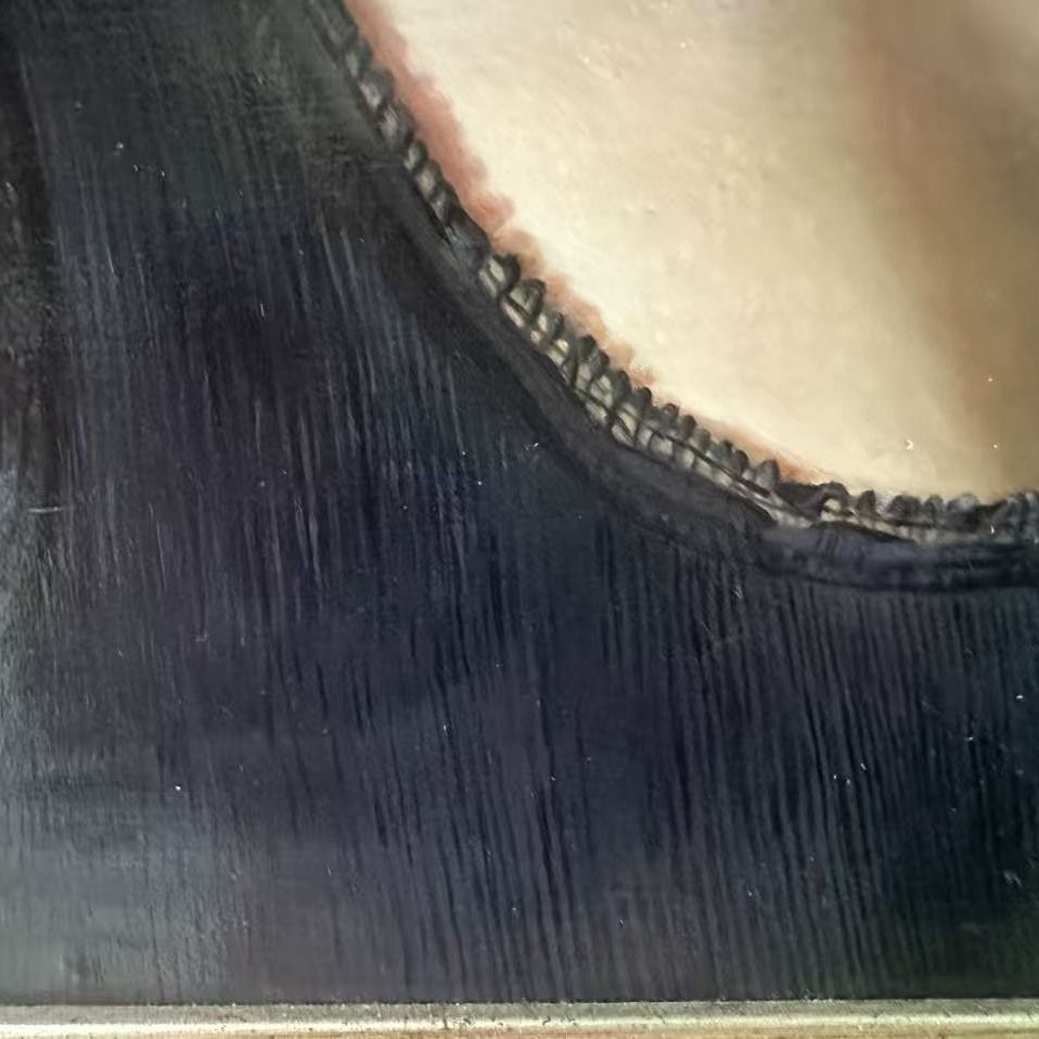 Macro photograph of painted black lace trim, each loop of the lace drawn separately