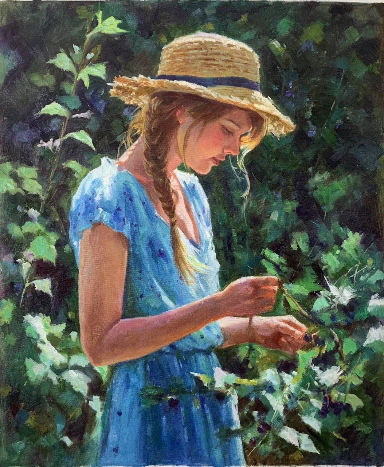 A girl in a straw hat and blue dress gathering flowers among green foliage.