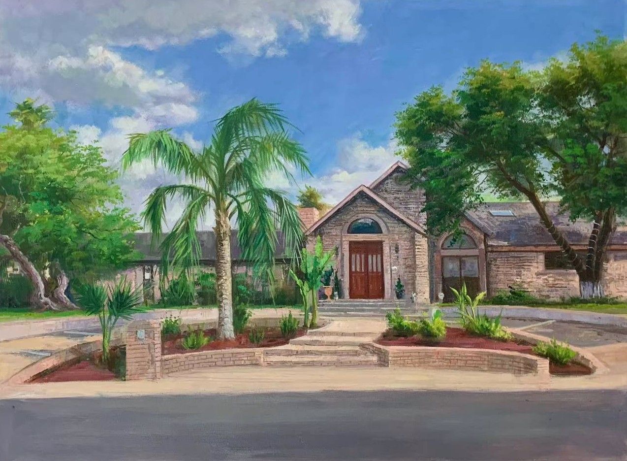 A brick house with palm trees, planting beds and a front path.