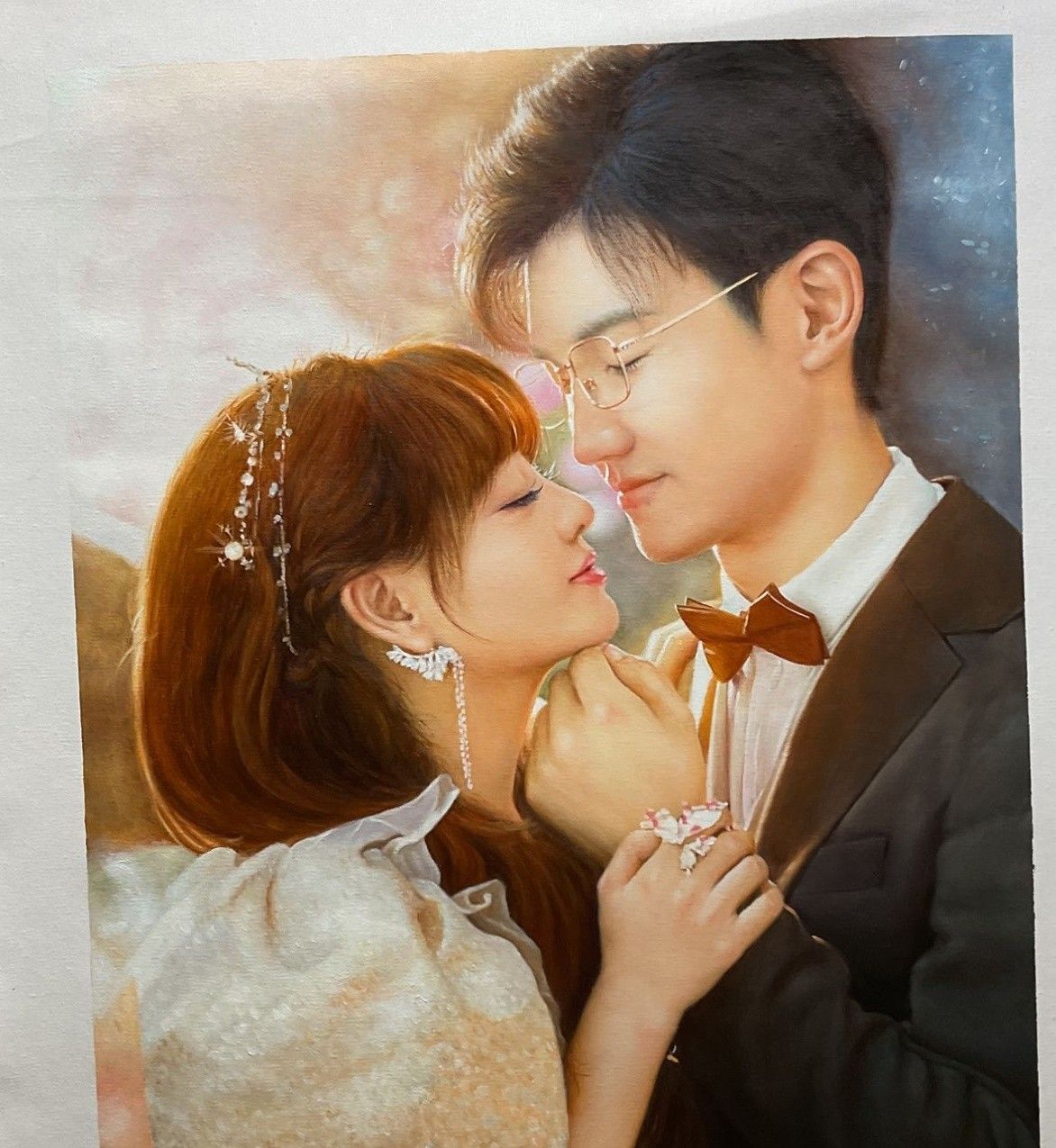 Hand-painted wedding portrait of a bride and groom leaning close together with their eyes closed.