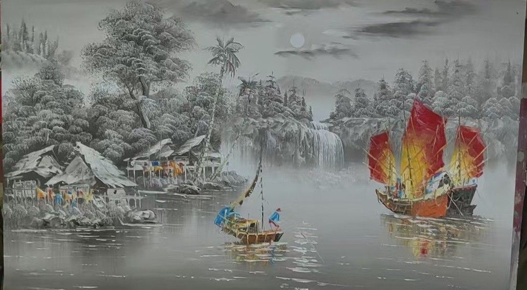 Sailboats with bright red sails cross a quiet river beneath a moonlit, monochrome mountain landscape.