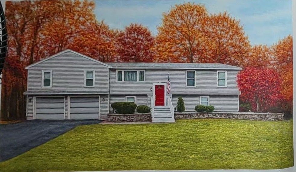 A pale house with a red door sits among autumn trees above a broad green lawn.